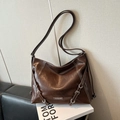 Deep brown leather tote bag with white contrast stitching and silver metal hardware details - Coffee without Pendant