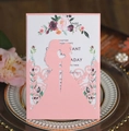 Detailed laser-cut pink wedding invitation with romantic couple silhouette and flowers - Pink