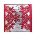Detail of laser-cut red snowflake wedding invitation with elegant white printed inner card - Pearlescent Red