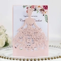 Detailed laser-cut bridal dress wedding invitation on a golden glass tray - Nude Pink
