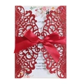 Detail of red glitter laser-cut invitation with satin bow and floral inner card - Glitter Red