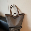 Bolso tote de lona gris minimalista con asas de cuero marrón y gran capacidad - Marrón Oscuro