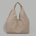 Macro shot of large capacity beige tote bag showing high-quality nylon fabric texture - Khaki