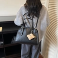 Black quilted leather handbag with plush star charm and versatile shoulder strap - With Charm / Black