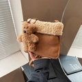 Brown faux suede crossbody bag with beige lamb wool trim and a teddy bear plush charm - Khaki With Pendant
