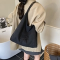 Borsa tote in tela nera con ricamo QZBG e strisce strutturate da donna - Nero