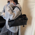Large black minimalist tote bag in faux leather with shoulder straps and pendant - Black