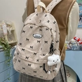 Japanischer Cord-Rucksack in Beige mit Schleifenmuster und flauschigem Anhänger - Beige mit Anhänger