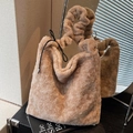 Plush faux fur underarm bag in apricot beige featuring a ruffled scrunchie handle - Light Brown