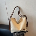 Minimalist beige canvas tote bag with dark brown straps and leather brand tag - Khaki