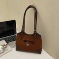 Vintage brown suede tote bag with heart pendant and bow detail in a stylish setting - Brown No Pendant