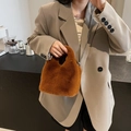 Brown faux fur bucket bag with silver metal chain strap for women, plush winter handbag - Caramel color