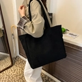 Minimalist black large capacity tote bag in matte fabric for casual daily use - Black