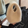 Chic faux fur bucket bag in cream white featuring elegant silver chain strap - Light Khaki