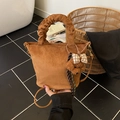 Mini borsa a secchiello marrone in pelle opaca con ciondolo a orsetto e manico - Con Ciondolo / Marrone