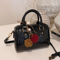 Glossy black Boston bag with patent leather texture and plush charm accessory - With Charm / Black