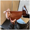 Brown saddle bag with textured leather and heart pattern silk scarf detail on handle - Brown
