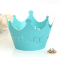 Detail of turquoise laser-cut cupcake wrappers with Prince text and star cutout design - Turquoise Blue