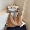 Brown woven leather hobo bag with large capacity and matching shoulder strap in minimalist style - Khaki