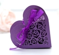 Detail of laser-cut rose patterns on a purple heart-shaped gift box with silk ribbon - Dark Purple