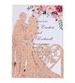 Detail of rose gold glitter laser cut invitation with Mr & Mrs heart silhouette and floral inner card - Glitter Champagne Gold