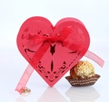 Detailed laser-cut heart candy box in red with elegant floral patterns and a silk ribbon - Pearlescent Red