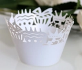 Incarti per cupcake bianchi intagliati al laser con motivi festivi per decorazioni - Bianco