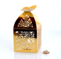 Detail view of laser-cut rose patterns and butterfly clasp on golden wedding favor box - Reflective Gold