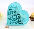 Detail of laser-cut rose pattern on heart-shaped tiffany blue candy gift box with ribbon - Tiffany Blue