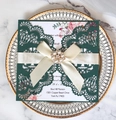 Detail of laser-cut wedding invitation with green hollow cover and pearl ribbon bow - Dark Green Hollow Cover With Satin Bow And Pearl Buckle (HK-5)