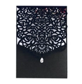Detail of black laser-cut rose wedding invitation with droplet crystal and floral insert - Black