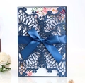 Elegant navy blue laser-cut wedding invitation with floral insert and silk ribbon bow - Dark Blue