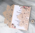 Detailed laser-cut pattern on dark red wedding invitation with floral insert - Nude Pink