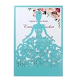 Detail of laser-cut wedding invitation featuring a blue hollow princess dress outer cover - Tiffany Blue