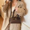 Deep brown matte leather tote bag with metal buckle straps and detachable shoulder strap - Coffee
