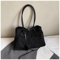 Detail of black suede tote bag with matte finish and polished faux leather handles - Black