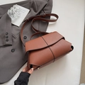 Brown faux leather shoulder bag with white contrast stitching and gold-tone hardware - Tan