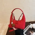 Red suede crescent handbag with round handle and decorative plush pom-pom charms - With Charm / Red