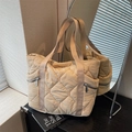 Quilted beige puffer tote bag with large diamond stitching and side zipper pockets - Khaki