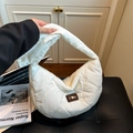 Quilted white hobo shoulder bag with heart embroidery and stylish puffer fabric texture - White
