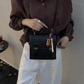 Black woven textured crossbody bag with colorful wooden beads and adjustable strap - Black with Pendant