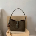 Deep olive green frosted shoulder bag with vintage leaf pendant on wooden chair - With Charm / Green
