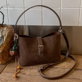 Brown matte suede shoulder bag with vintage metal buckle and adjustable strap - With Charm / Brown