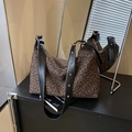 Fashionable leopard print tote bag with black leather straps and gold zipper details - Brown
