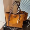 Brown suede tote bag with dark leather handles and decorative wooden bead tassel charm - With Charm / Brown