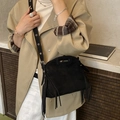 Retro black matte suede shoulder bag with long side tassels and cut-out top handle - Black