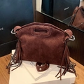 Vintage donkerbruine suède handtas met franjes aan de zijkant en ovaal handvat - Bruin