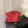 Deep red frosted suede crossbody bag with long fringes and unique hollowed handle design - Red