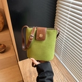 Avocado green frosted bucket bag with dark brown leather strap and golden buckle - Green