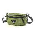 Close-up of green grid ripstop fabric and tactical buckle on casual crossbody bag - Green